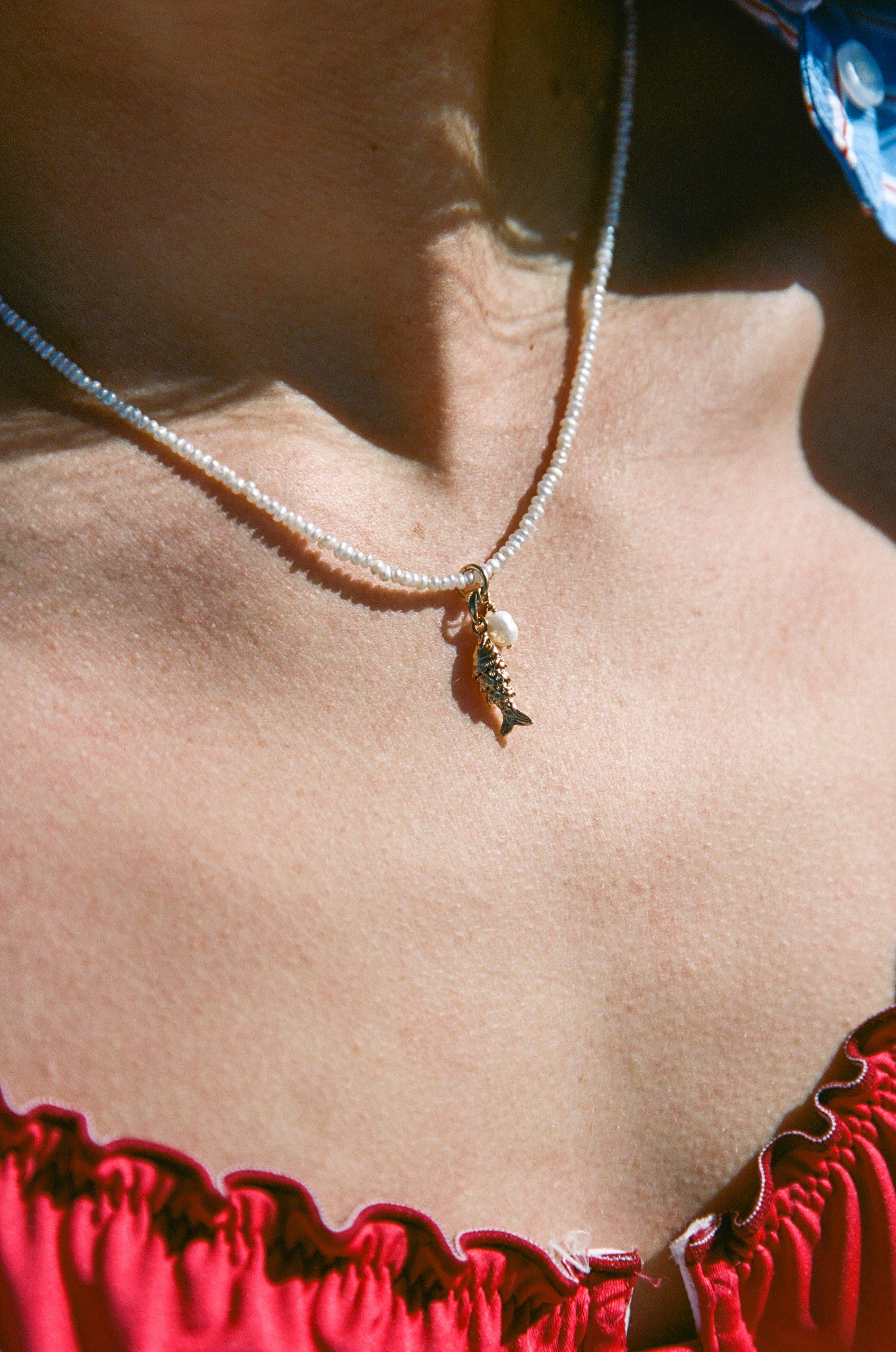 Collier_pez_nacres_c5c78cc5-a891-4db9-b279-2daf3eaaef69.jpg